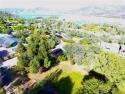 This .20 -Acre lake view lot on Jack Hill Drive in Kelly Ridge for sale in Oroville California Butte County County on GolfHomes.com
