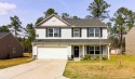 Welcome to 517 Timbercreek Dr, a stunning 5-bedroom, 2 for sale in Loris South Carolina Horry County County on GolfHomes.com