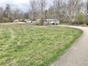 This level corner lot a is located in the Sunnybrook Subdivision for sale in Olive Hill Kentucky Carter County County on GolfHomes.com