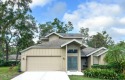 ONE OF A KIND 4-BEDROOM 3-FULL BATH HOME IN EXCLUSIVE 24-7 GATED for sale in Port Orange Florida Volusia County County on GolfHomes.com