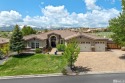 Welcome to this beautifully appointed 4-bedroom, 3-bathroom home for sale in Reno Nevada Washoe County County on GolfHomes.com