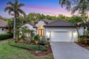 WELCOME TO YOUR NEW HOME conveniently located behind the gates for sale in Bradenton Florida Manatee County County on GolfHomes.com