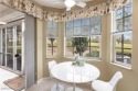 Spacious FIRST FL END UNIT with Golf Membership and offered for sale in Fort Myers Florida Lee County County on GolfHomes.com