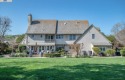 Exuding timeless sophistication, this French Country-inspired for sale in Pleasanton California Alameda County County on GolfHomes.com