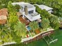 Architectural masterpiece with interiors designed by Dori Kabel for sale in Miami  Beach Florida Miami-Dade County County on GolfHomes.com