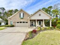 Escape to paradise with this stunning coastal home! This for sale in Longs South Carolina Horry County County on GolfHomes.com