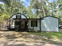 This stunning 2-bedroom, 2-bath partially furnished manufactured for sale in Hemphill Texas Sabine County County on GolfHomes.com