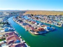 Nestled on the serene shores of North Lake , this exquisite for sale in Helendale California San Bernardino County County on GolfHomes.com