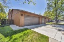 Love where you live in this beautifully maintained end-unit for sale in Reno Nevada Washoe County County on GolfHomes.com