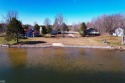 Absolutely Stunning Views on this  1/2  acre lakefront lot with for sale in Gladwin Michigan Gladwin County County on GolfHomes.com