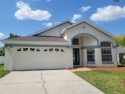 In a gated community is this  3 bedroom, 2 bath single-family for sale in Kissimmee Florida Osceola County County on GolfHomes.com
