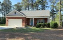 Welcome to this charming 3-bedroom, 2.5-bath home located in the for sale in Pinebluff North Carolina Moore County County on GolfHomes.com