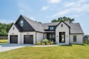 Stunning 2-year-new home in Lone Oak Crossing! This modern for sale in Pottsboro Texas Grayson County County on GolfHomes.com