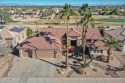 Nestled along the 11th fairway of the prestigious Granite Falls for sale in Surprise Arizona Maricopa County County on GolfHomes.com