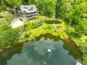 5.75 acres at 3300 feet elevation with 2 ponds and a waterfall for sale in Dillard Georgia Rabun County County on GolfHomes.com