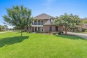 Beautiful custom built home located at Persimmon in Graywood for sale in Lake Charles Louisiana Calcasieu Parish County on GolfHomes.com