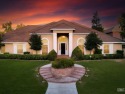 This stunning 5,509 sq ft custom estate sits on the golf course for sale in Bakersfield California Kern County County on GolfHomes.com