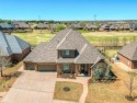 Experience luxury living at its finest in this stunning home for sale in Edmond Oklahoma Oklahoma County County on GolfHomes.com