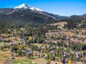 Located in the heart of Big Sky's Meadow area, 2575 Curley Bear for sale in Big Sky Montana Gallatin County County on GolfHomes.com