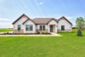 This upgraded new construction home features a premier location for sale in Blanchard Oklahoma Grady County County on GolfHomes.com