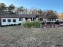 Spacious lake home on 2.9 acre lot with boat dock in place and for sale in Manson North Carolina Vance County County on GolfHomes.com
