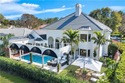 Discover timeless elegance and effortless luxury at 180 Edgemere for sale in Naples Florida Collier County County on GolfHomes.com