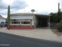 Very nice updated and mostly furnished home with laminate for sale in Tucson Arizona Pima County County on GolfHomes.com