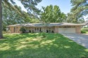 Charming home on extra large lush corner lot in the exclusive, Texas