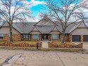 Nestled on Hole 16 of Adam's Golf Course, this gorgeous for sale in Bartlesville Oklahoma Washington County County on GolfHomes.com