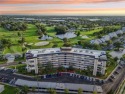 Stunning golf course and pond views from a light-filled corner for sale in Seminole Florida Pinellas County County on GolfHomes.com