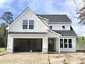 Brand new construction located in Woodland Valley overlooking for sale in Loris South Carolina Horry County County on GolfHomes.com