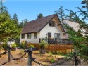Discover this charming Gearhart West A-frame retreat. Set across for sale in Gearhart Oregon Clatsop County County on GolfHomes.com