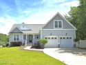 Experience lakefront living in this beautifully updated home on for sale in New Bern North Carolina Craven County County on GolfHomes.com