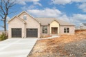 Welcome to this exquisite new construction home in Greystone for sale in Cabot Arkansas Lonoke County County on GolfHomes.com