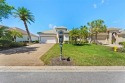 Welcome to this stunning three-bedroom, two-bathroom for sale in Port Charlotte Florida Charlotte County County on GolfHomes.com