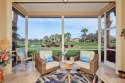 Turnkey and Gorgeous!! Imagine waking up to this tranquil view for sale in Bonita Springs Florida Lee County County on GolfHomes.com