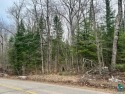 Here is your chance to have acreage and lake access! This parcel for sale in Cloquet Minnesota Carlton County County on GolfHomes.com