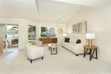 Step inside and be greeted by a light-filled living space that for sale in Waipahu Hawaii Oahu  County County on GolfHomes.com