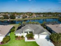 Immaculate Spruce Creek Fly-In Waterfront Pool Home with open for sale in Port Orange Florida Volusia County County on GolfHomes.com