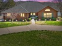 Beautiful custom lake front log home on three lots inside a for sale in Hillsboro Missouri Jefferson County County on GolfHomes.com