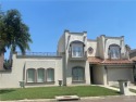 Gorgeous 2-story stucco home, waterfront with a beautiful view for sale in Mission Texas Hidalgo County County on GolfHomes.com