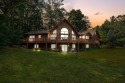 This home reflects a deep appreciation for quality and comfort for sale in Bellaire Michigan Antrim County County on GolfHomes.com