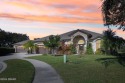 Rare offering in gated Cypress Head- 6 CAR GARAGE! All the car for sale in Port Orange Florida Volusia County County on GolfHomes.com