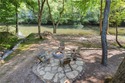 Riverfront living at it's finest with 110 feet of river frontage for sale in Ellijay Georgia Gilmer County County on GolfHomes.com
