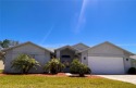 Motivated Seller! Make an offer! This GORGEOUS single-level for sale in Hudson Florida Pasco County County on GolfHomes.com