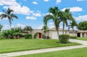 This stylish & charming lake front home with coastal flair & for sale in Naples Florida Collier County County on GolfHomes.com