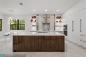 Live the ultimate country club lifestyle in this exquisitely for sale in Pompano Beach Florida Broward County County on GolfHomes.com