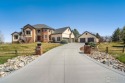 Located in Highland Hills, this exquisite property is nestled for sale in Fort Collins Colorado Larimer County County on GolfHomes.com