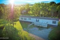 Welcome to your country home! Situated in a gorgeous valley on for sale in Tazewell Tennessee Claiborne County County on GolfHomes.com