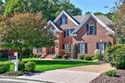 Discover effortless elegance in this custom brick home nestled for sale in Suffolk Virginia Suffolk County County on GolfHomes.com